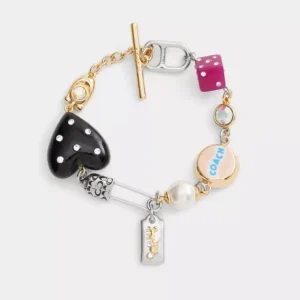 Armband mit Sicherheitsnadel- und Herz-Anhängern*COACH Store